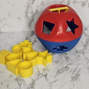 Vintage Tupperware Shape-O Ball, a classic educational shape sorter toy